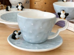 Penguin Perch Egg-Shaped Ceramic Coffee Cup & Saucer Set – 3D Penguin Handle & Saucer Design