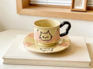 Yellow Pear Puppy Footed Ceramic Coffee Cup & Scalloped Saucer Set – Black Curved Handle Design